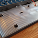 A little shelf liner in my keyboard case dampened the sound, similar to the way aluminum cases do on high-end boards.